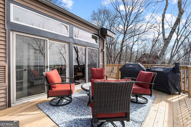 wooden deck with grilling area