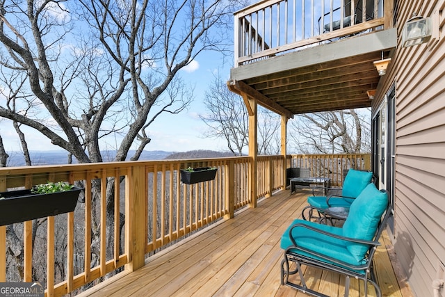 wooden terrace with a mountain view