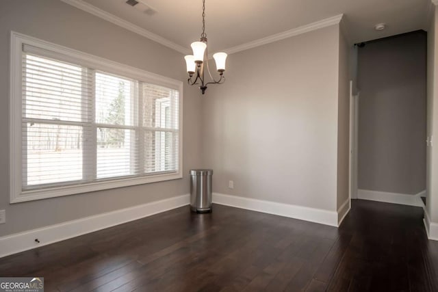 unfurnished dining area featuring dark wood-style floors, visible vents, crown molding, and baseboards