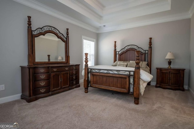 bedroom with baseboards, a raised ceiling, light colored carpet, and crown molding