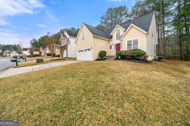 traditional-style home with a front yard, concrete driveway, crawl space, and stucco siding