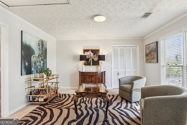 living area featuring a textured ceiling, light carpet, visible vents, baseboards, and crown molding