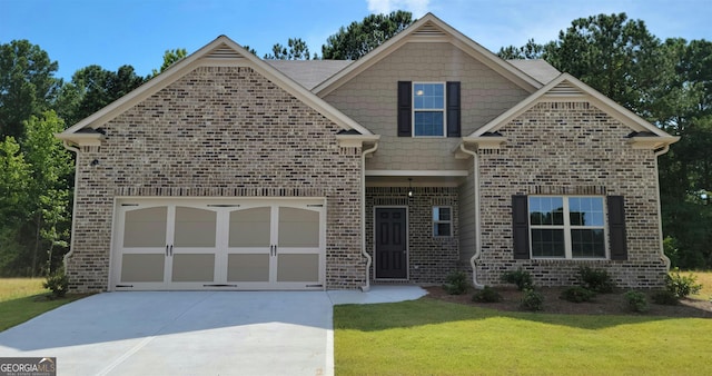 view of front of home featuring driveway, a front lawn, an attached garage, and brick siding