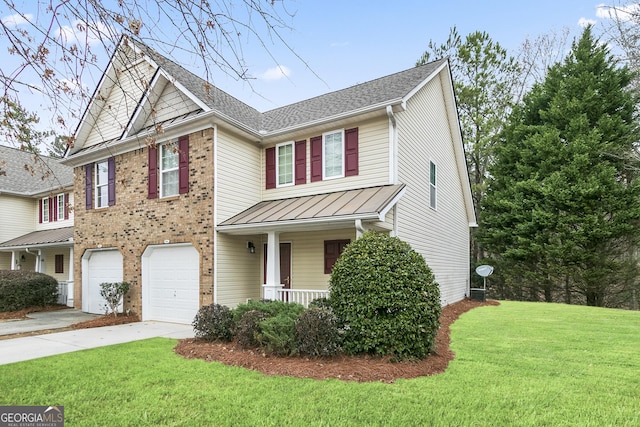 view of front of home with a standing seam roof, a porch, concrete driveway, an attached garage, and a front yard