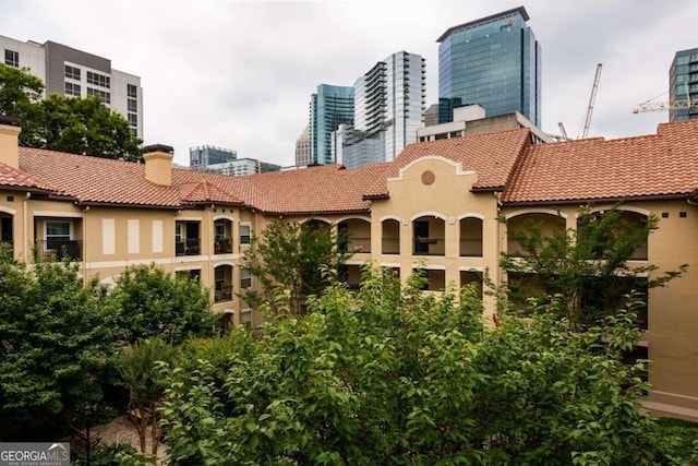 view of building exterior featuring a city view