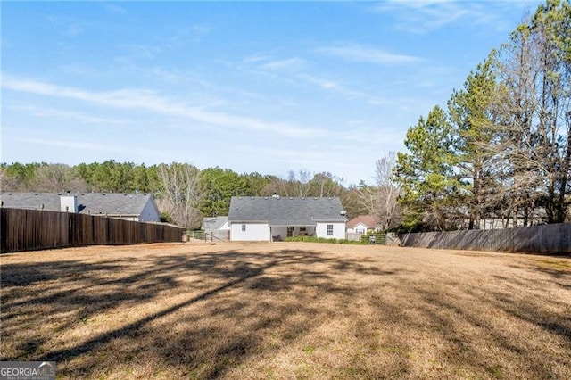 view of yard featuring fence