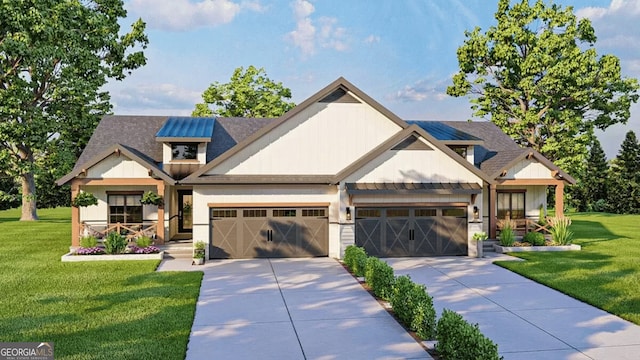 craftsman house featuring a front yard, concrete driveway, and an attached garage