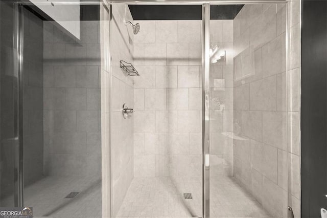 full bathroom with a shower stall