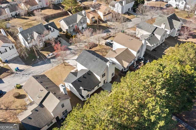 birds eye view of property with a residential view