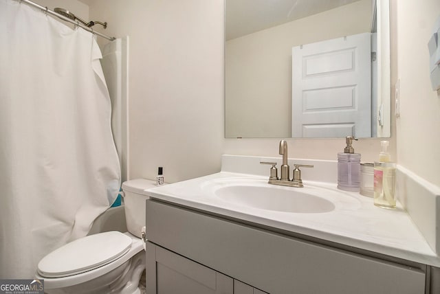 full bath featuring toilet, a shower with curtain, and vanity