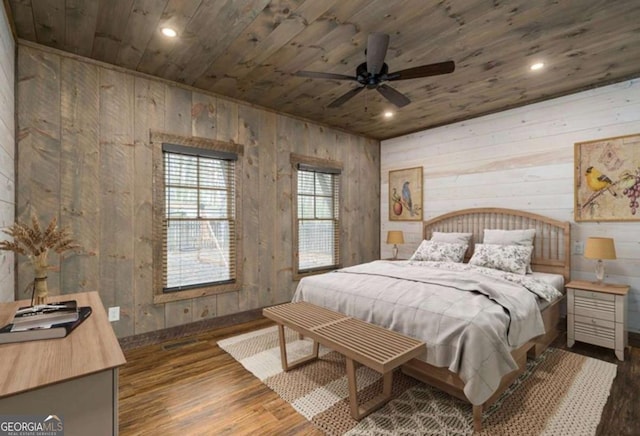 bedroom with recessed lighting, wood ceiling, wood walls, and wood finished floors