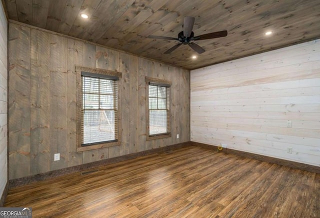 empty room featuring baseboards, wooden ceiling, ceiling fan, wood finished floors, and recessed lighting