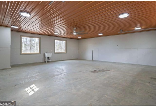 empty room featuring unfinished concrete flooring