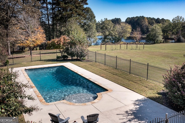 view of swimming pool with a water view, a fenced backyard, and a lawn