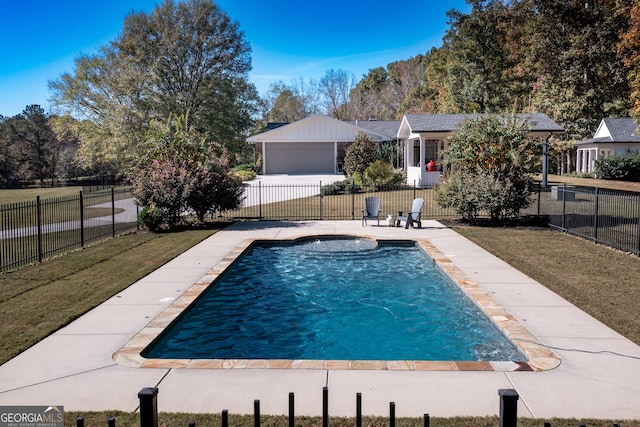 view of swimming pool featuring a yard, a patio area, fence, and a fenced in pool