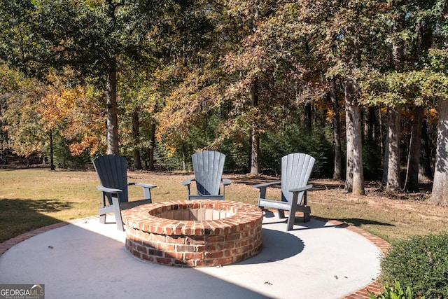 view of patio with an outdoor fire pit