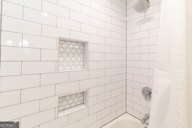 bathroom featuring shower / bathtub combination with curtain