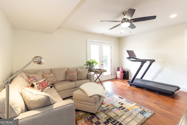 living area with ceiling fan, baseboards, wood finished floors, and recessed lighting