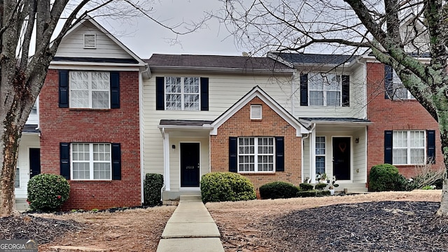 view of front of home with brick siding