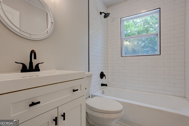 bathroom with toilet, shower / washtub combination, and vanity