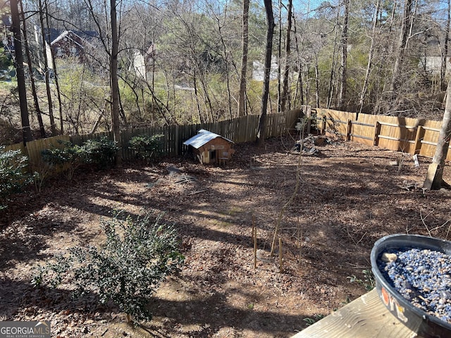 view of yard with a fenced backyard