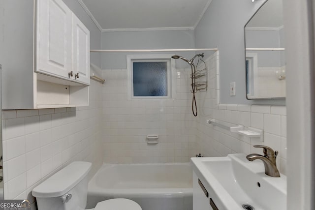 full bathroom with toilet, a sink, tile walls, and crown molding