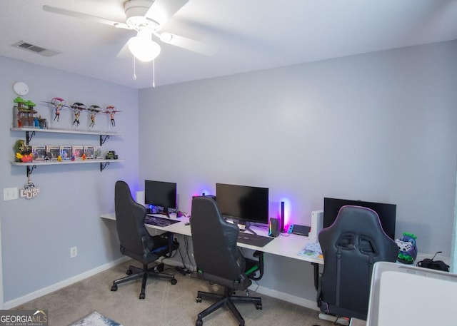 office with baseboards, ceiling fan, visible vents, and carpet flooring