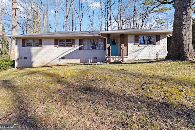 ranch-style house with crawl space, a front lawn, and brick siding