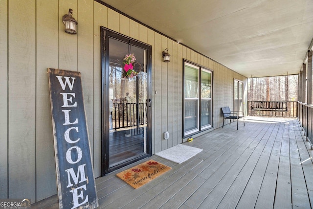 wooden deck featuring a porch