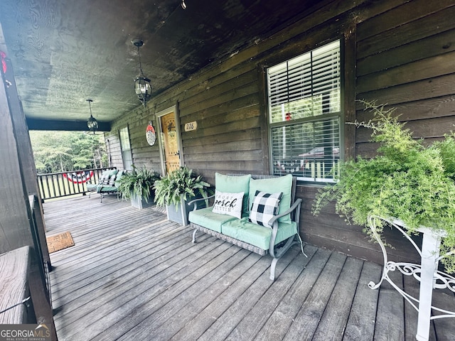 wooden terrace with covered porch