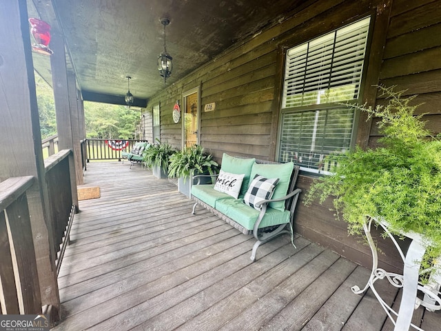 deck with covered porch