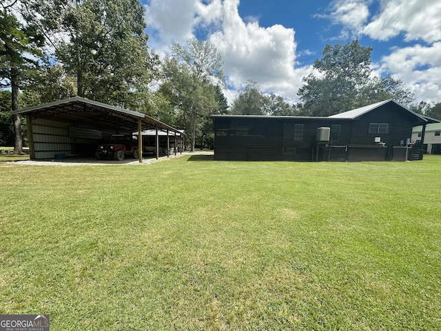 view of yard featuring a carport