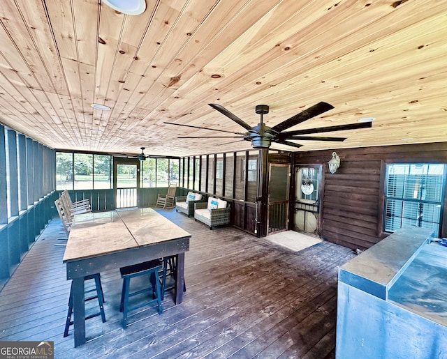 interior space featuring wooden ceiling and wood finished floors