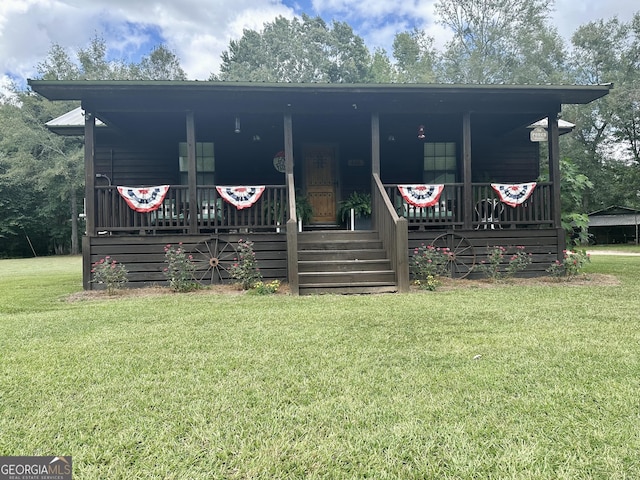 view of front of home with a front yard