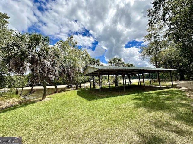 view of home's community with a lawn