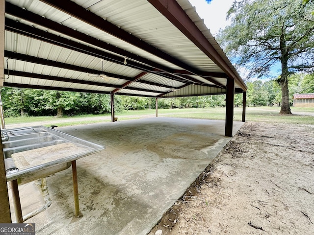 exterior space with a carport