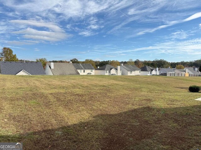 view of yard with a residential view