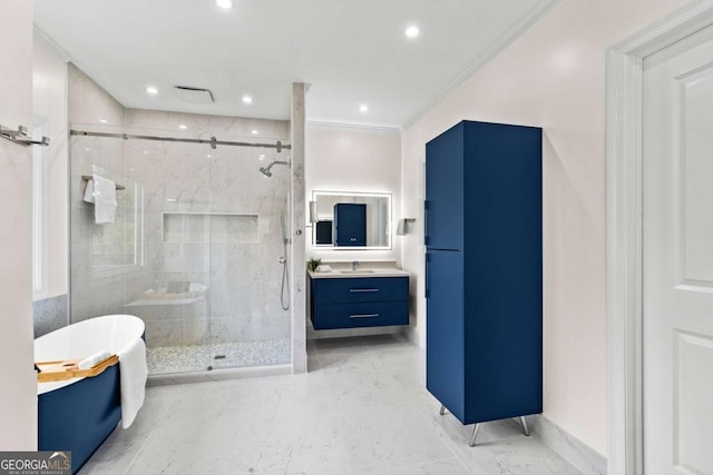 bathroom featuring crown molding, marble finish floor, a freestanding tub, and a marble finish shower