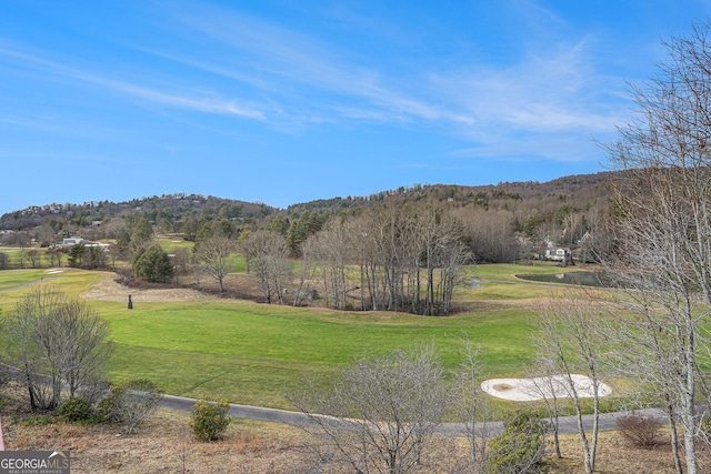 view of mountain feature featuring view of golf course