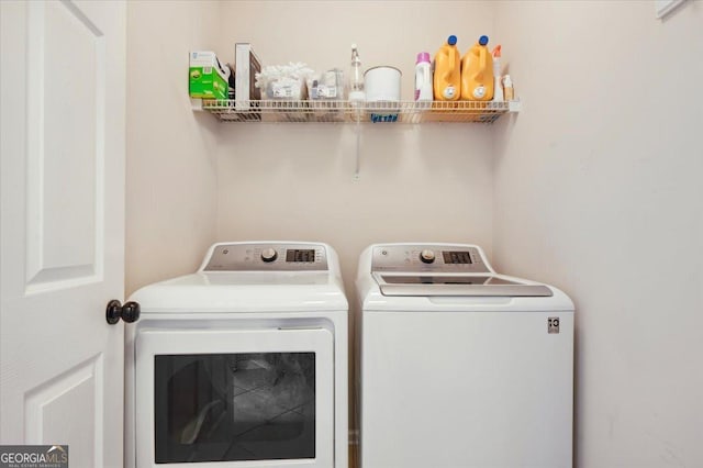 laundry room featuring laundry area and washing machine and clothes dryer