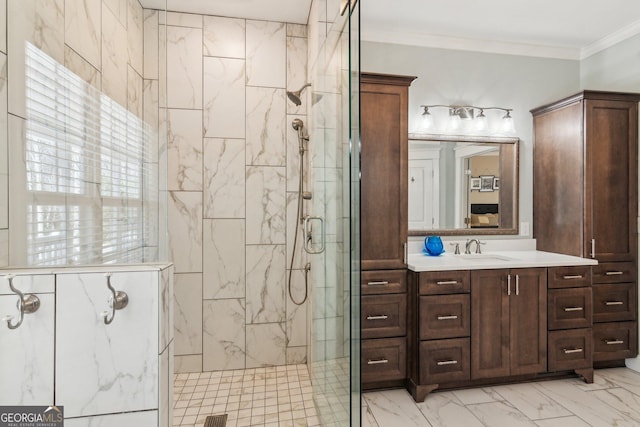 full bath featuring marble finish floor, a marble finish shower, crown molding, and vanity