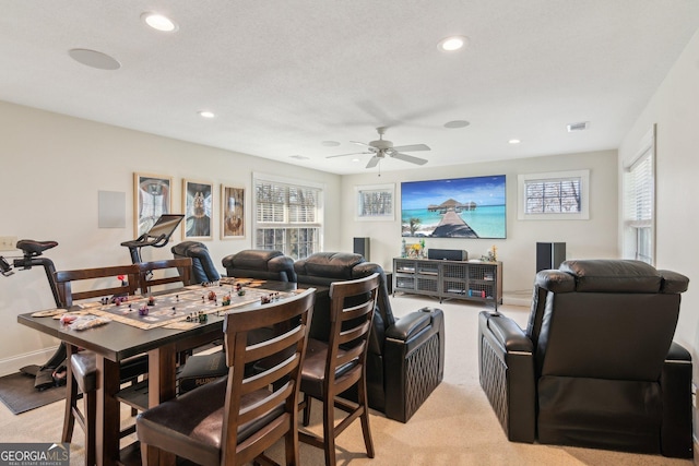 dining room with light carpet, ceiling fan, visible vents, and recessed lighting