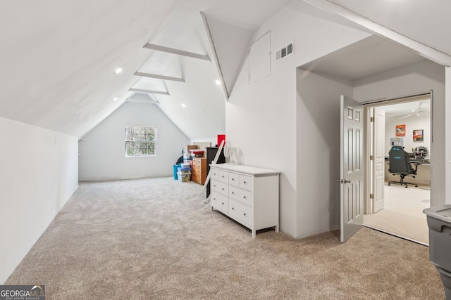 bonus room with vaulted ceiling with beams, visible vents, and light colored carpet