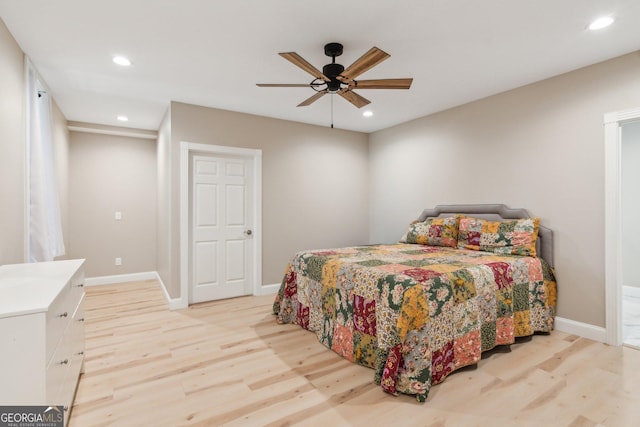 bedroom featuring recessed lighting, baseboards, and light wood finished floors