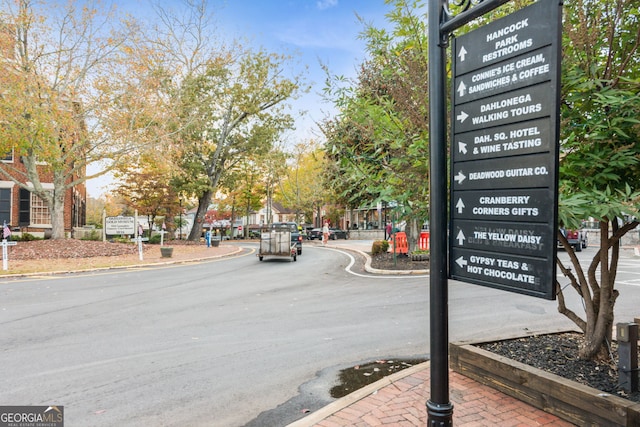 view of road with curbs