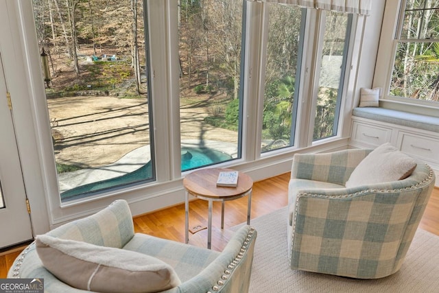 sunroom / solarium featuring a wealth of natural light