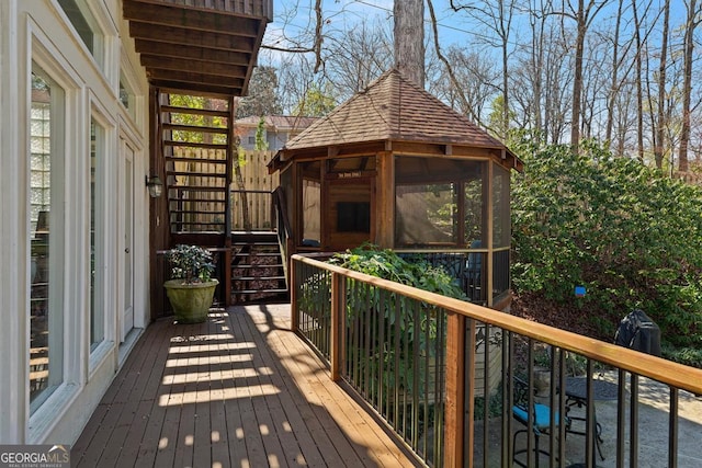 wooden deck with a gazebo