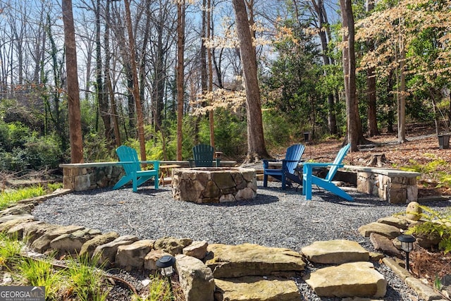 exterior space with a fire pit