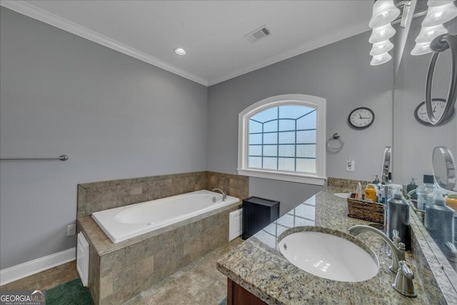 bathroom featuring a garden tub, crown molding, double vanity, visible vents, and a sink