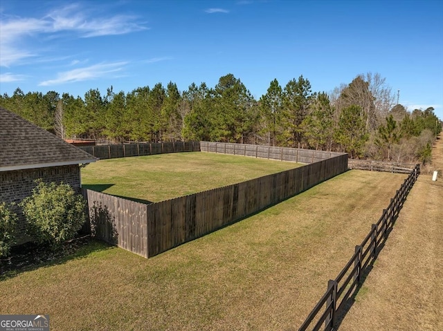 view of yard featuring fence